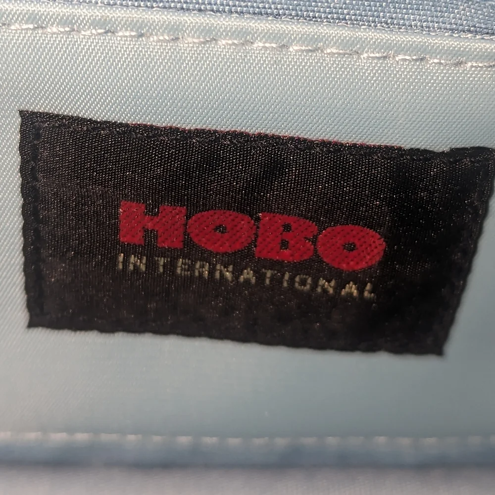 Hobo International cream leather shoulder bag.